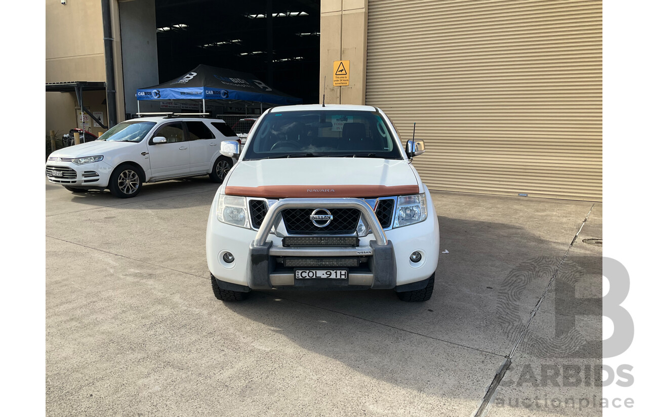 9/2013 Nissan Navara ST-X 550 (4x4) D40 MY12 Dual Cab Utility White Turbo Diesel 3.0L
