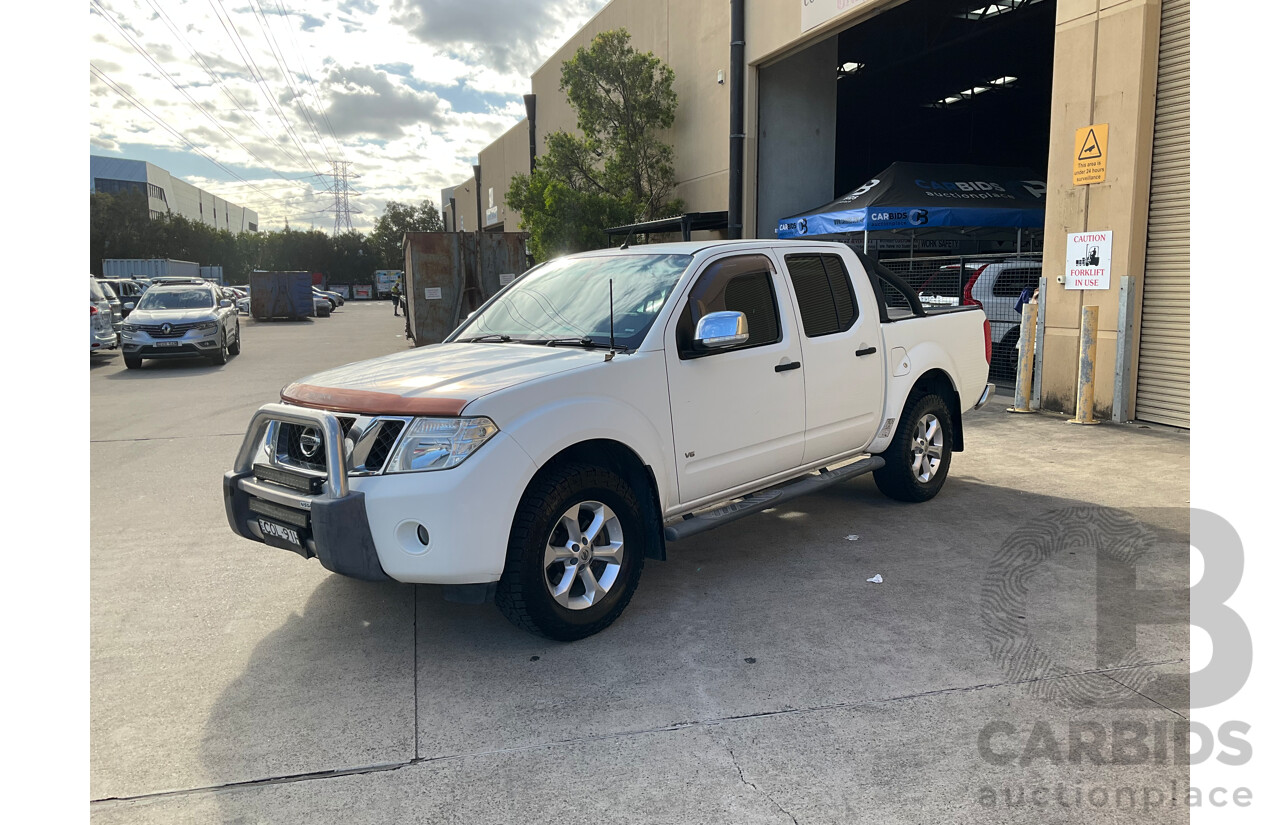 9/2013 Nissan Navara ST-X 550 (4x4) D40 MY12 Dual Cab Utility White Turbo Diesel 3.0L
