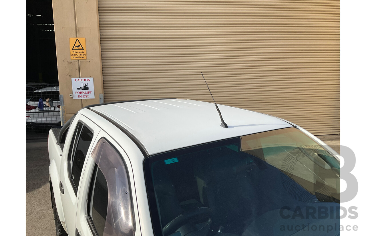 9/2013 Nissan Navara ST-X 550 (4x4) D40 MY12 Dual Cab Utility White Turbo Diesel 3.0L