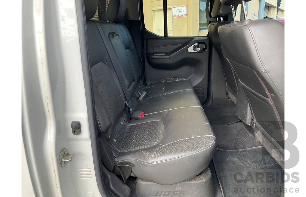 9/2013 Nissan Navara ST-X 550 (4x4) D40 MY12 Dual Cab Utility White Turbo Diesel 3.0L