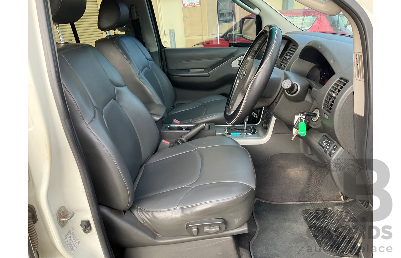 9/2013 Nissan Navara ST-X 550 (4x4) D40 MY12 Dual Cab Utility White Turbo Diesel 3.0L