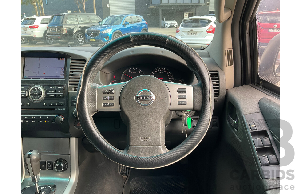 9/2013 Nissan Navara ST-X 550 (4x4) D40 MY12 Dual Cab Utility White Turbo Diesel 3.0L
