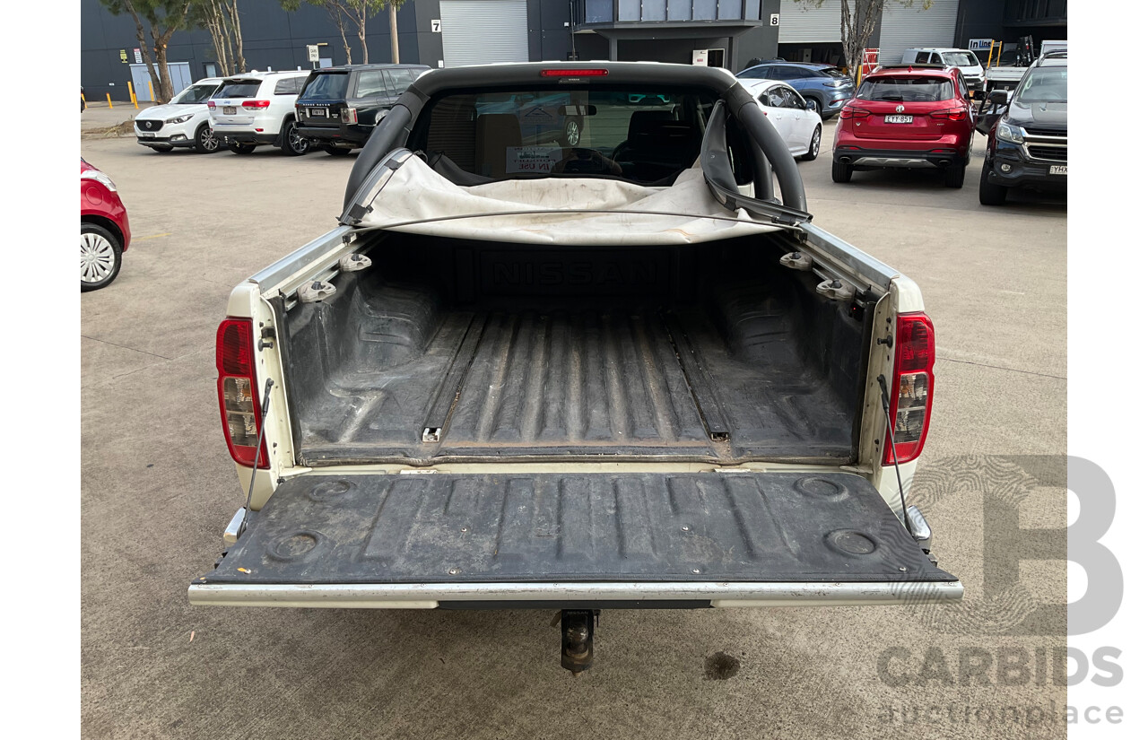 9/2013 Nissan Navara ST-X 550 (4x4) D40 MY12 Dual Cab Utility White Turbo Diesel 3.0L