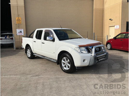 9/2013 Nissan Navara ST-X 550 (4x4) D40 MY12 Dual Cab Utility White Turbo Diesel 3.0L
