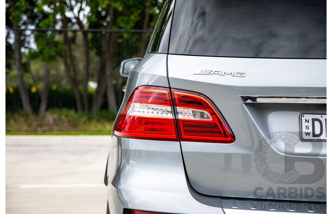 6/2012 Mercedes-Benz ML 63 AMG (4x4) 166 4d Wagon Palladium Silver Metallic Twin Turbo V8 5.5L