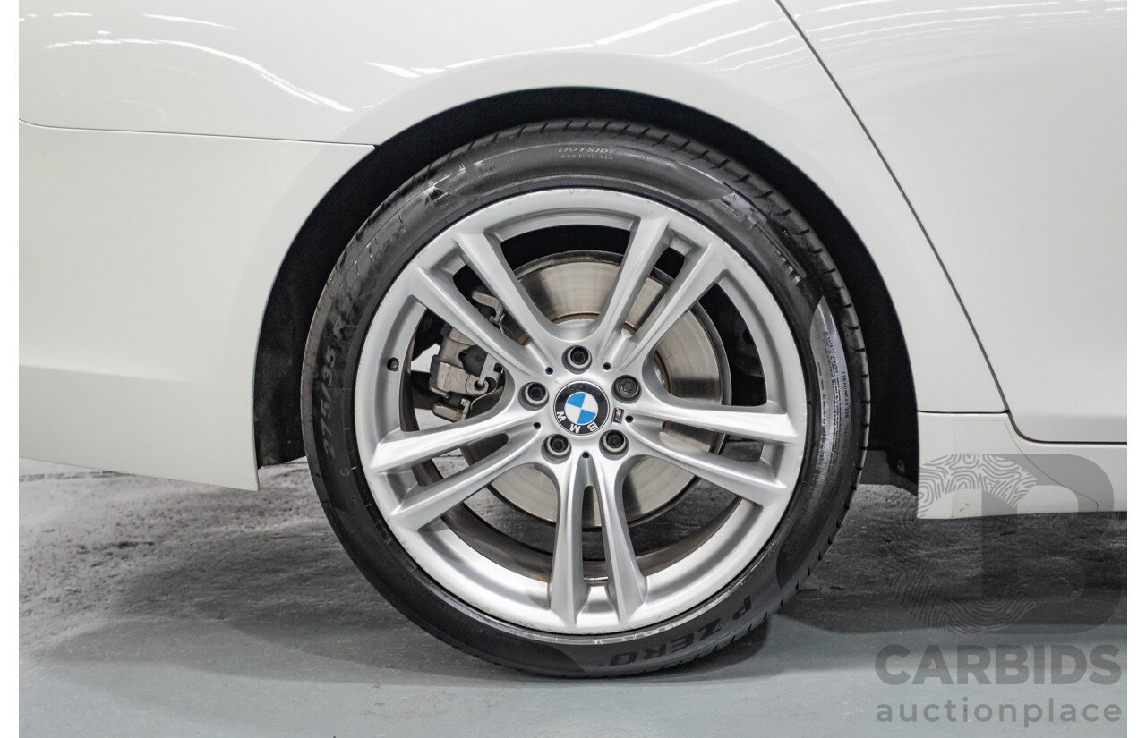 03/2013 Bmw 740i M-Sport F01 MY14 4D Sedan Alpine White Turbo 3.0L