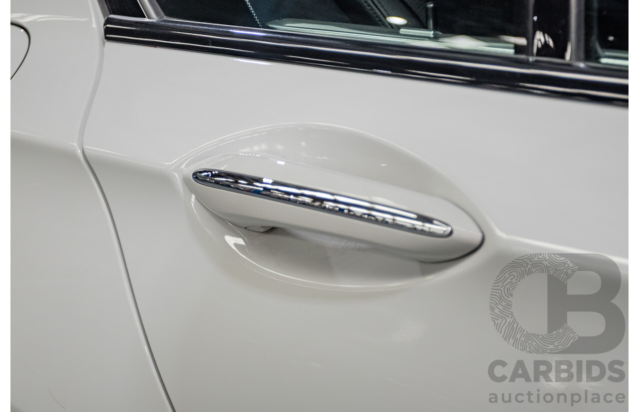 03/2013 Bmw 740i M-Sport F01 MY14 4D Sedan Alpine White Turbo 3.0L