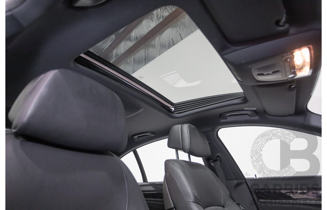 03/2013 Bmw 740i M-Sport F01 MY14 4D Sedan Alpine White Turbo 3.0L