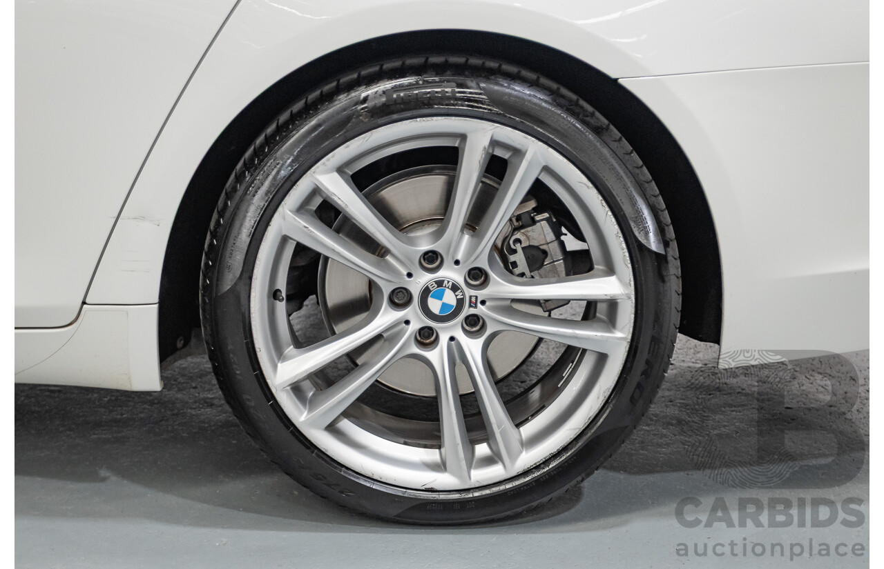 03/2013 Bmw 740i M-Sport F01 MY14 4D Sedan Alpine White Turbo 3.0L