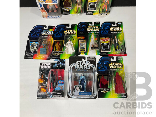 Collection of Star Wars Figures in Original Packaging
