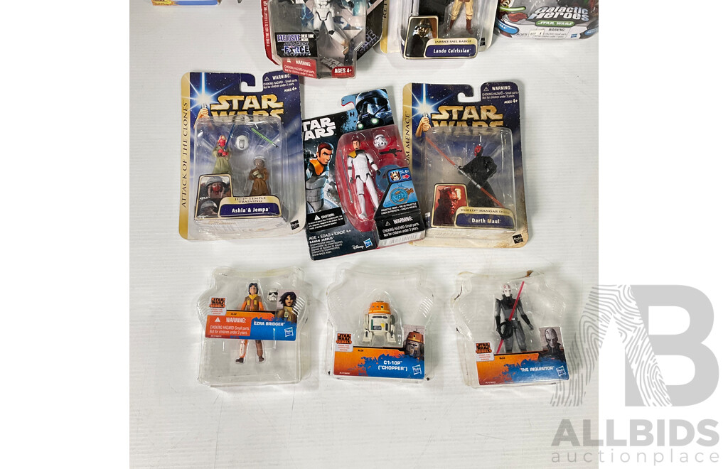 Collection of Star Wars Figures in Original Packaging