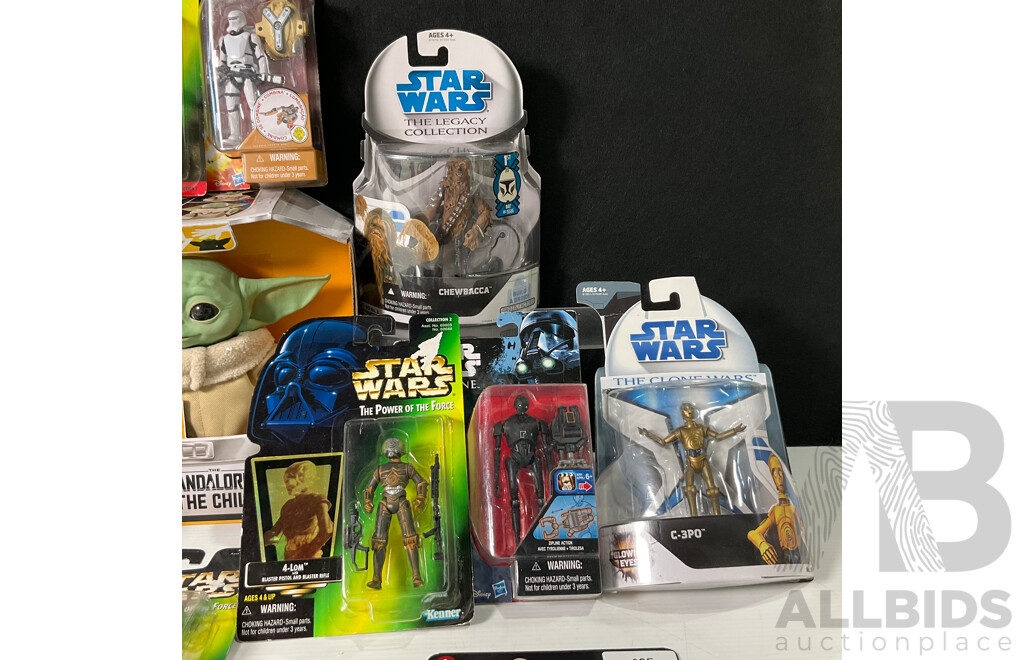 Collection of Star Wars Figures in Original Packaging