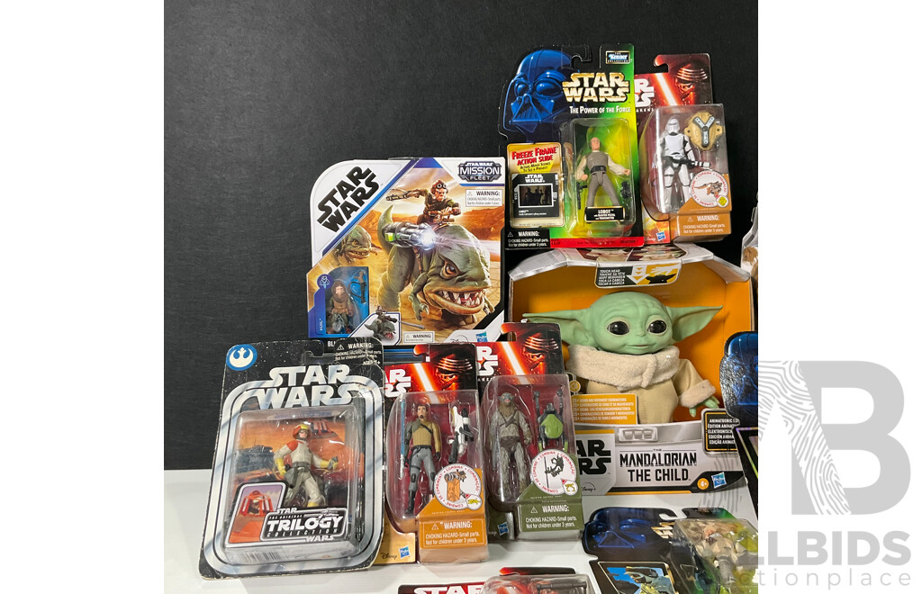 Collection of Star Wars Figures in Original Packaging