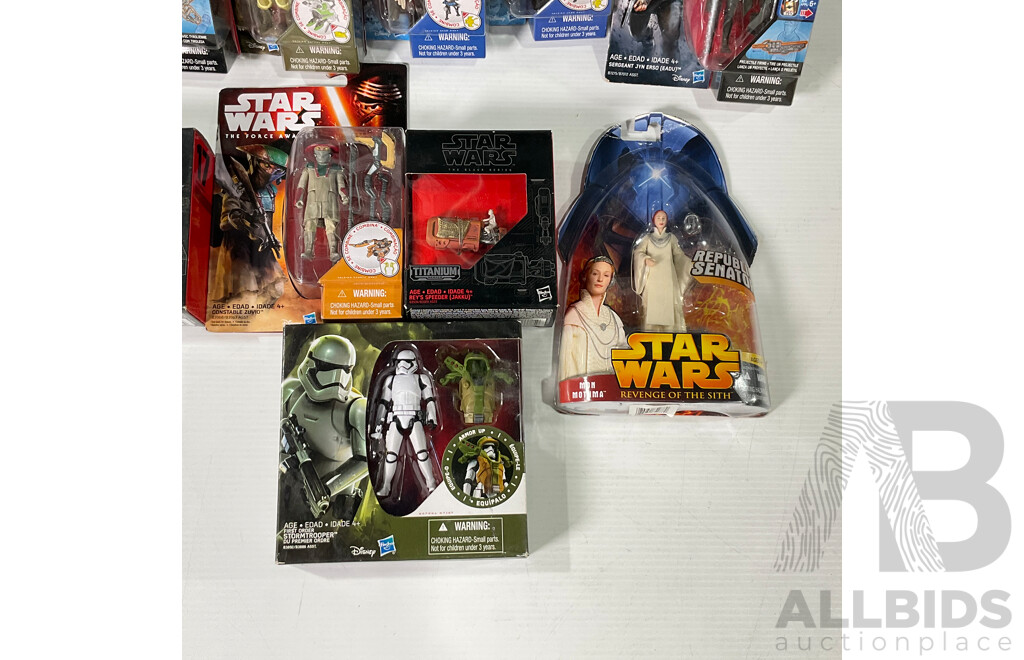 Collection of Star Wars Figures in Original Packaging