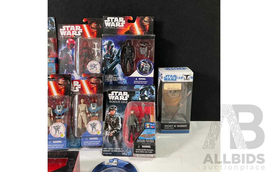 Collection of Star Wars Figures in Original Packaging