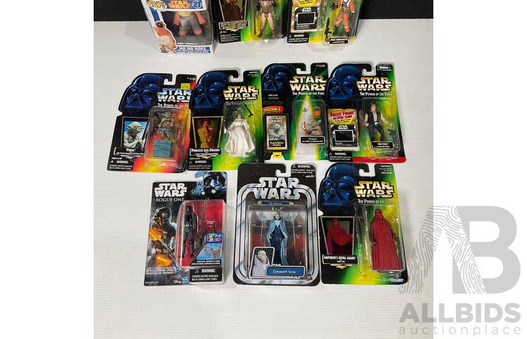 Collection of Star Wars Figures in Original Packaging