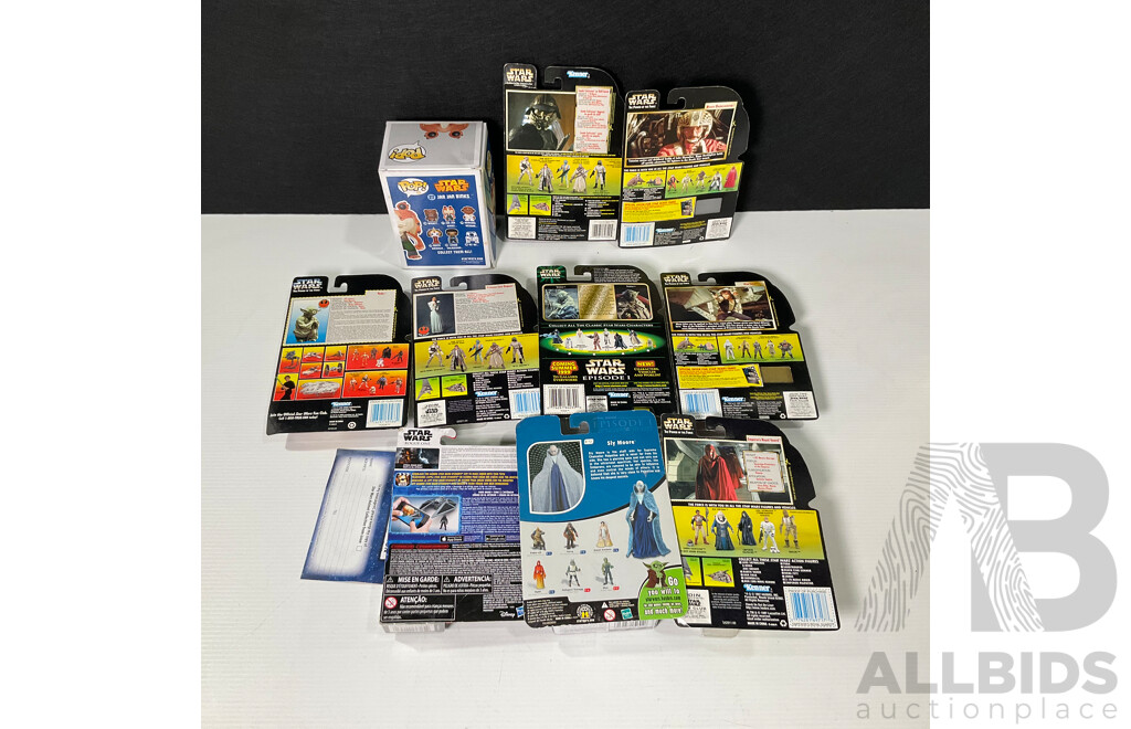 Collection of Star Wars Figures in Original Packaging