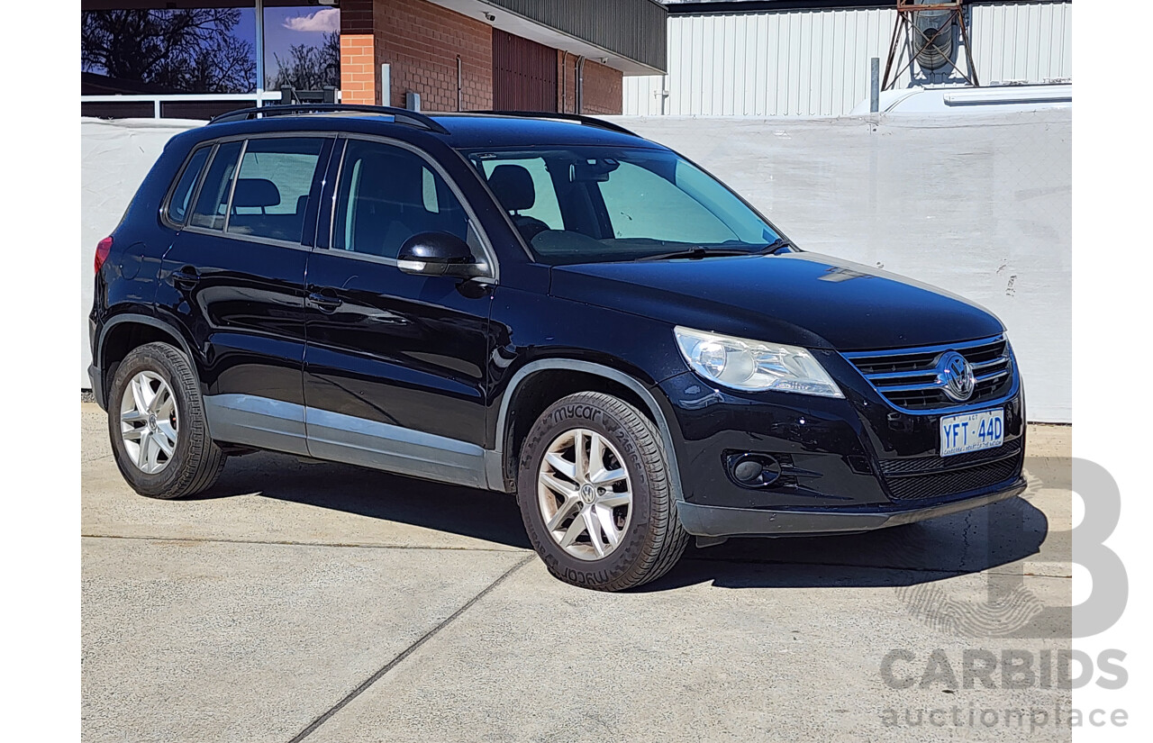 8/2009 Volkswagen Tiguan 103 TDI 5NC MY09 4d Wagon Black 2.0L