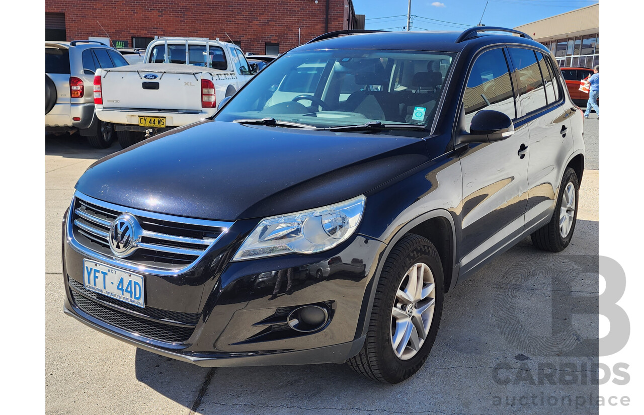 8/2009 Volkswagen Tiguan 103 TDI 5NC MY09 4d Wagon Black 2.0L