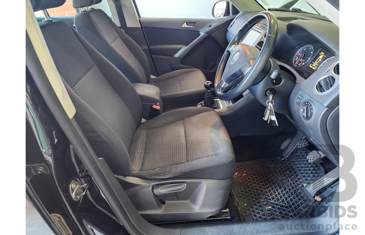8/2009 Volkswagen Tiguan 103 TDI 5NC MY09 4d Wagon Black 2.0L