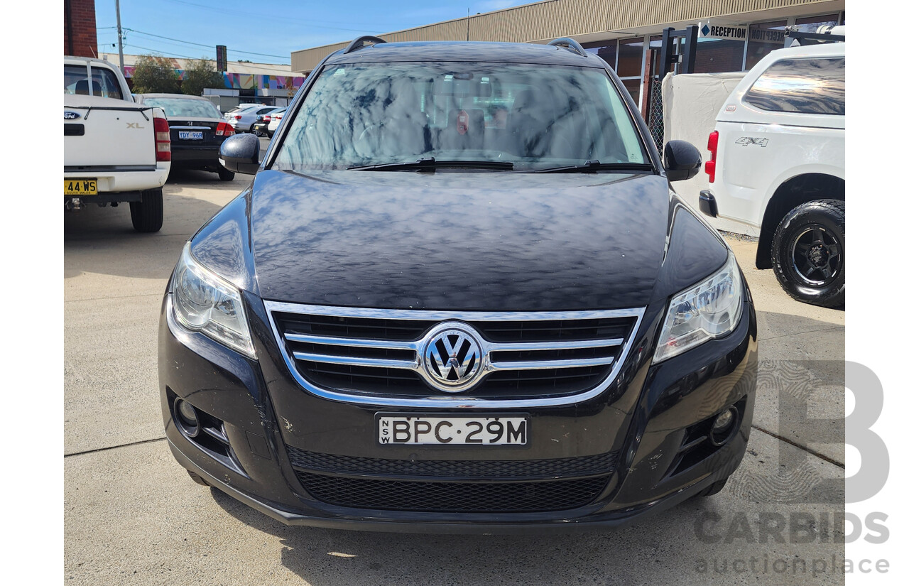 5/2010 Volkswagen Tiguan 103 TDI 5NC MY10 4d Wagon Black 2.0L