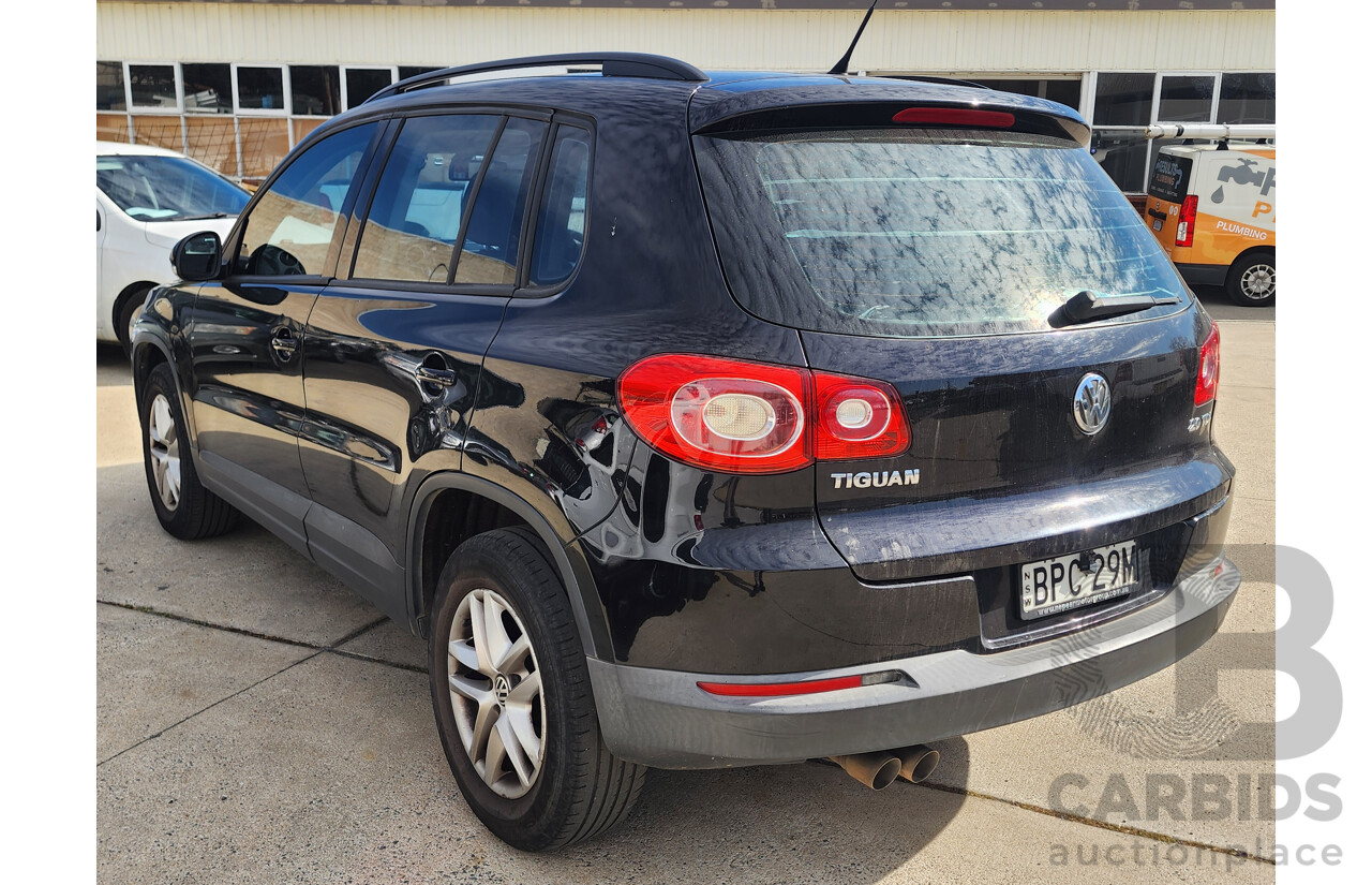 5/2010 Volkswagen Tiguan 103 TDI 5NC MY10 4d Wagon Black 2.0L