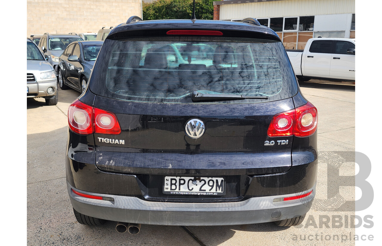 5/2010 Volkswagen Tiguan 103 TDI 5NC MY10 4d Wagon Black 2.0L