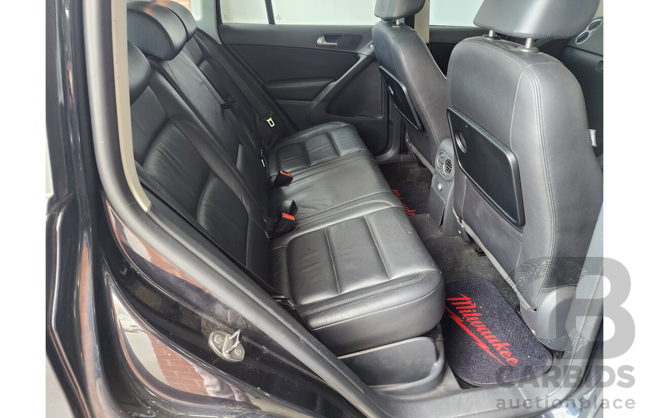 5/2010 Volkswagen Tiguan 103 TDI 5NC MY10 4d Wagon Black 2.0L