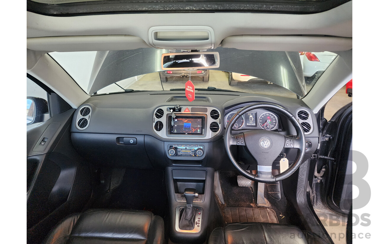 5/2010 Volkswagen Tiguan 103 TDI 5NC MY10 4d Wagon Black 2.0L