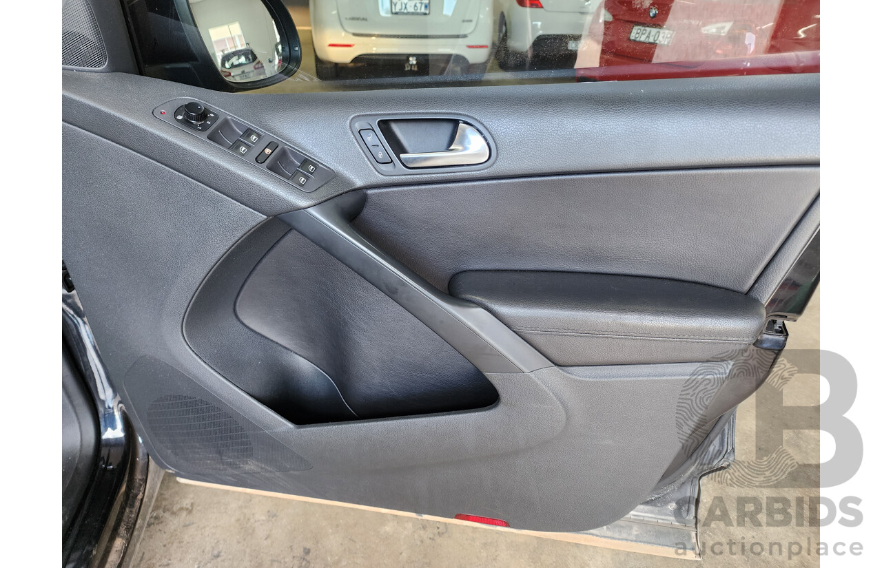 5/2010 Volkswagen Tiguan 103 TDI 5NC MY10 4d Wagon Black 2.0L