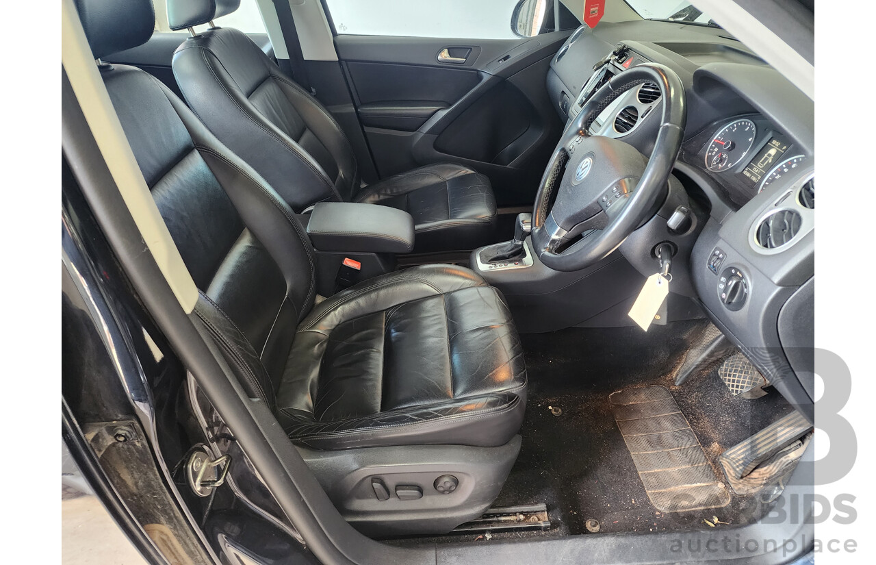 5/2010 Volkswagen Tiguan 103 TDI 5NC MY10 4d Wagon Black 2.0L