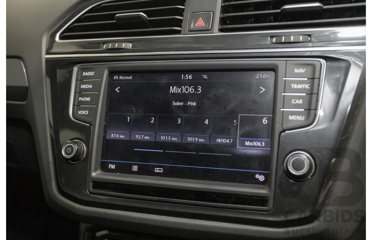 5/2017 Volkswagen Tiguan 162 TSI Highline (AWD) 5NA 4D Wagon Ruby Red Metallic Turbo 2.0L