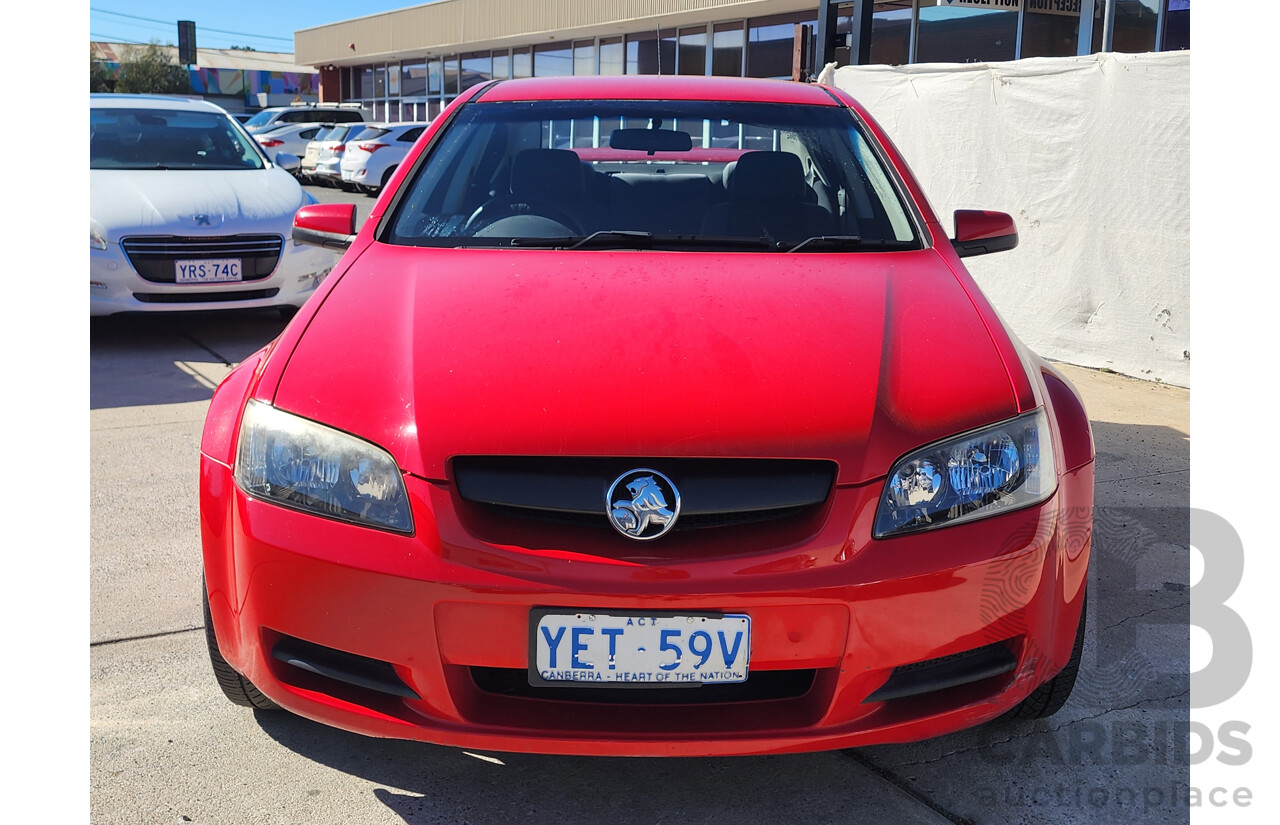 10/2006 Holden Commodore Omega V VE 4d Sedan Red 3.6L