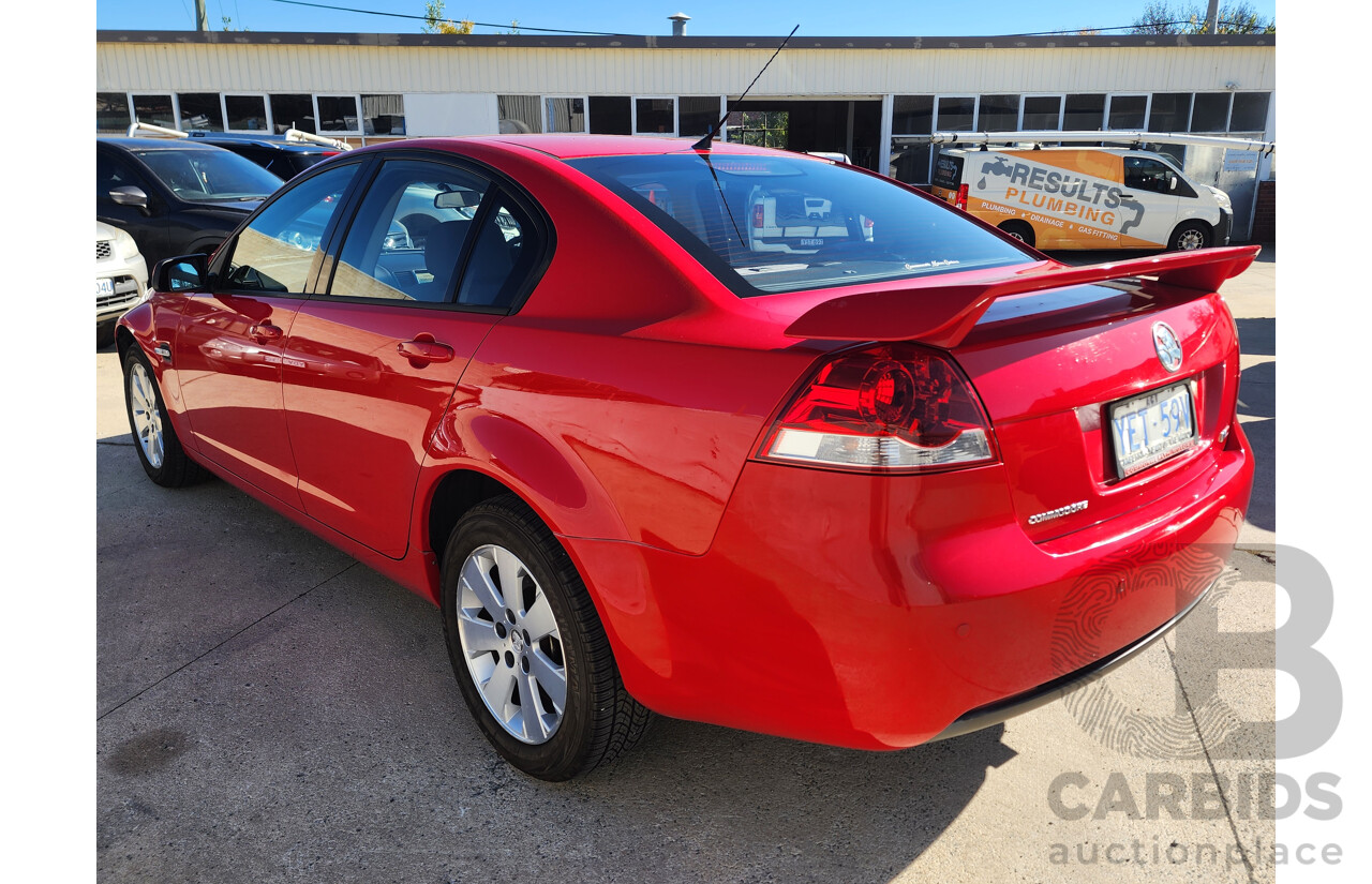 10/2006 Holden Commodore Omega V VE 4d Sedan Red 3.6L