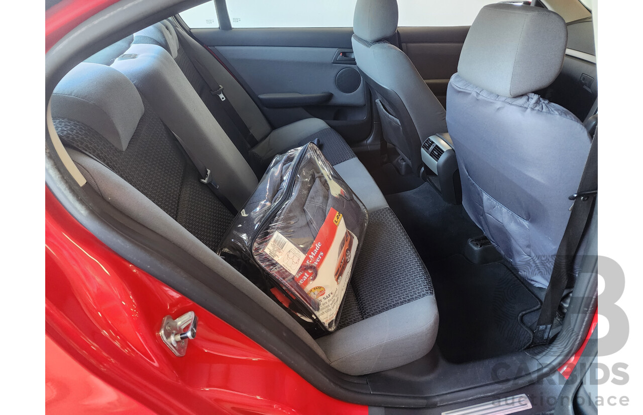 10/2006 Holden Commodore Omega V VE 4d Sedan Red 3.6L