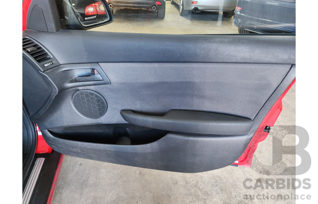 10/2006 Holden Commodore Omega V VE 4d Sedan Red 3.6L