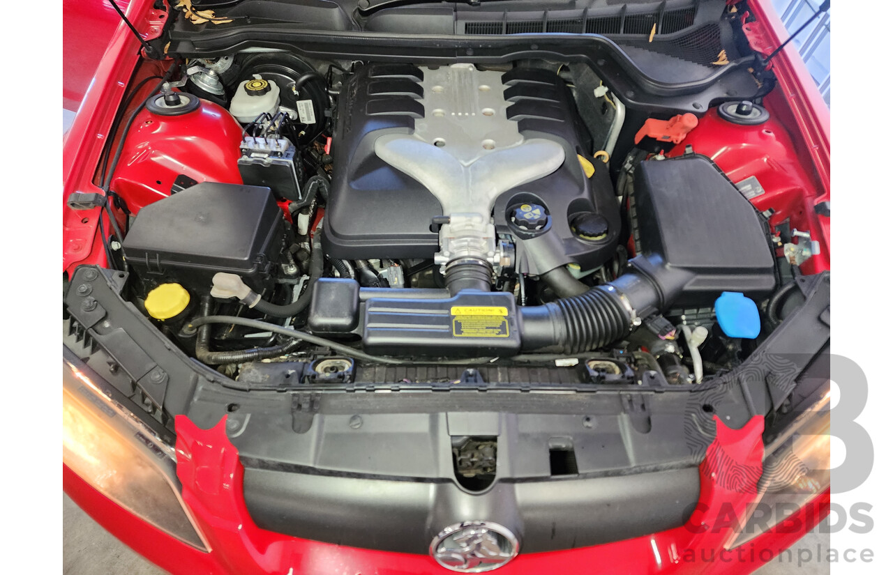 10/2006 Holden Commodore Omega V VE 4d Sedan Red 3.6L