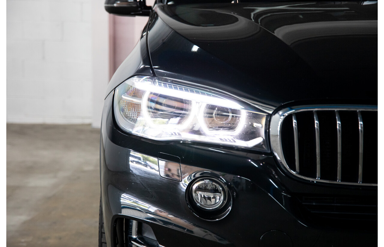 10/2014 BMW X5 Xdrive30d F15 MY15 4d Wagon Black Sapphire Metallic Turbo Diesel 3.0L