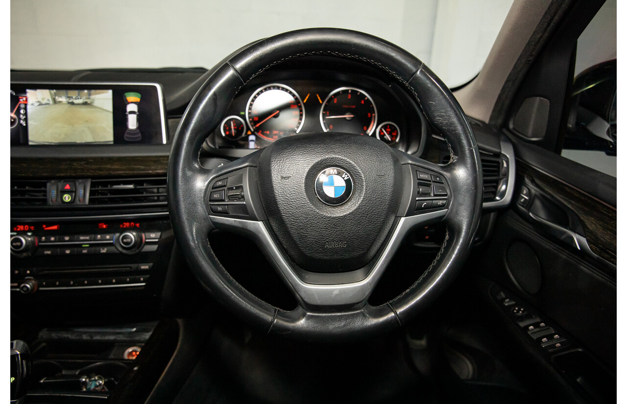 10/2014 BMW X5 Xdrive30d F15 MY15 4d Wagon Black Sapphire Metallic Turbo Diesel 3.0L