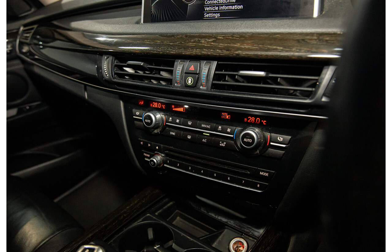 10/2014 BMW X5 Xdrive30d F15 MY15 4d Wagon Black Sapphire Metallic Turbo Diesel 3.0L