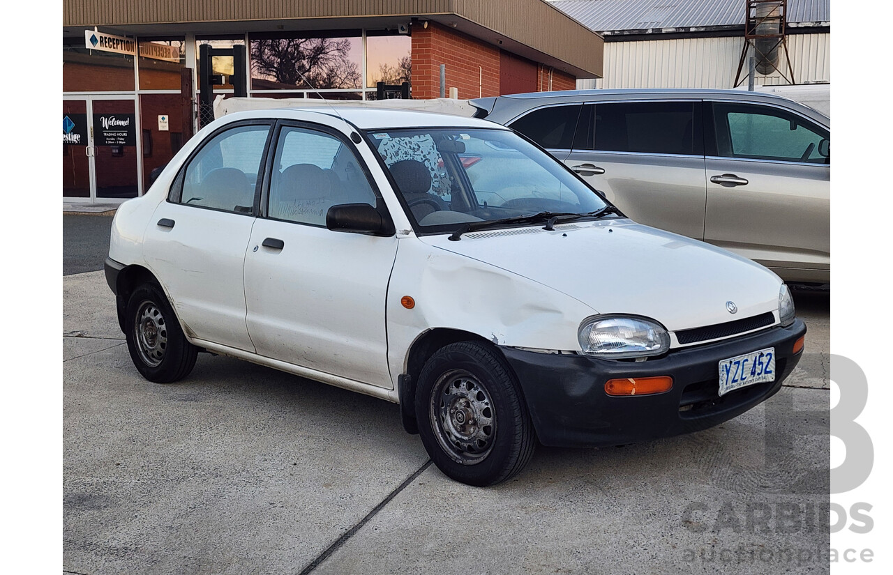 5/1995 Mazda 121   4d Sedan White 1.3L