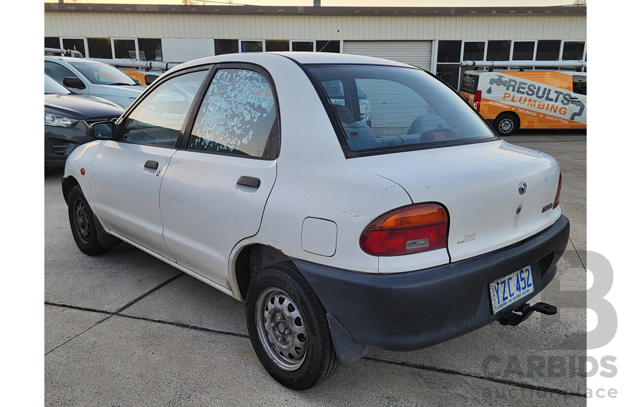 5/1995 Mazda 121   4d Sedan White 1.3L