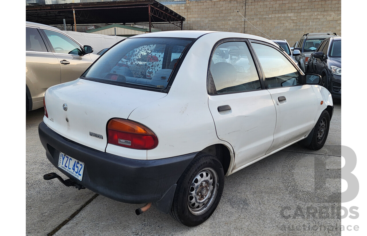 5/1995 Mazda 121   4d Sedan White 1.3L