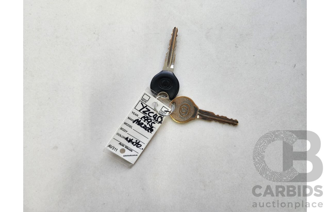 5/1995 Mazda 121   4d Sedan White 1.3L