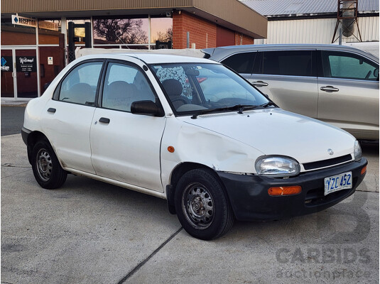 5/1995 Mazda 121   4d Sedan White 1.3L
