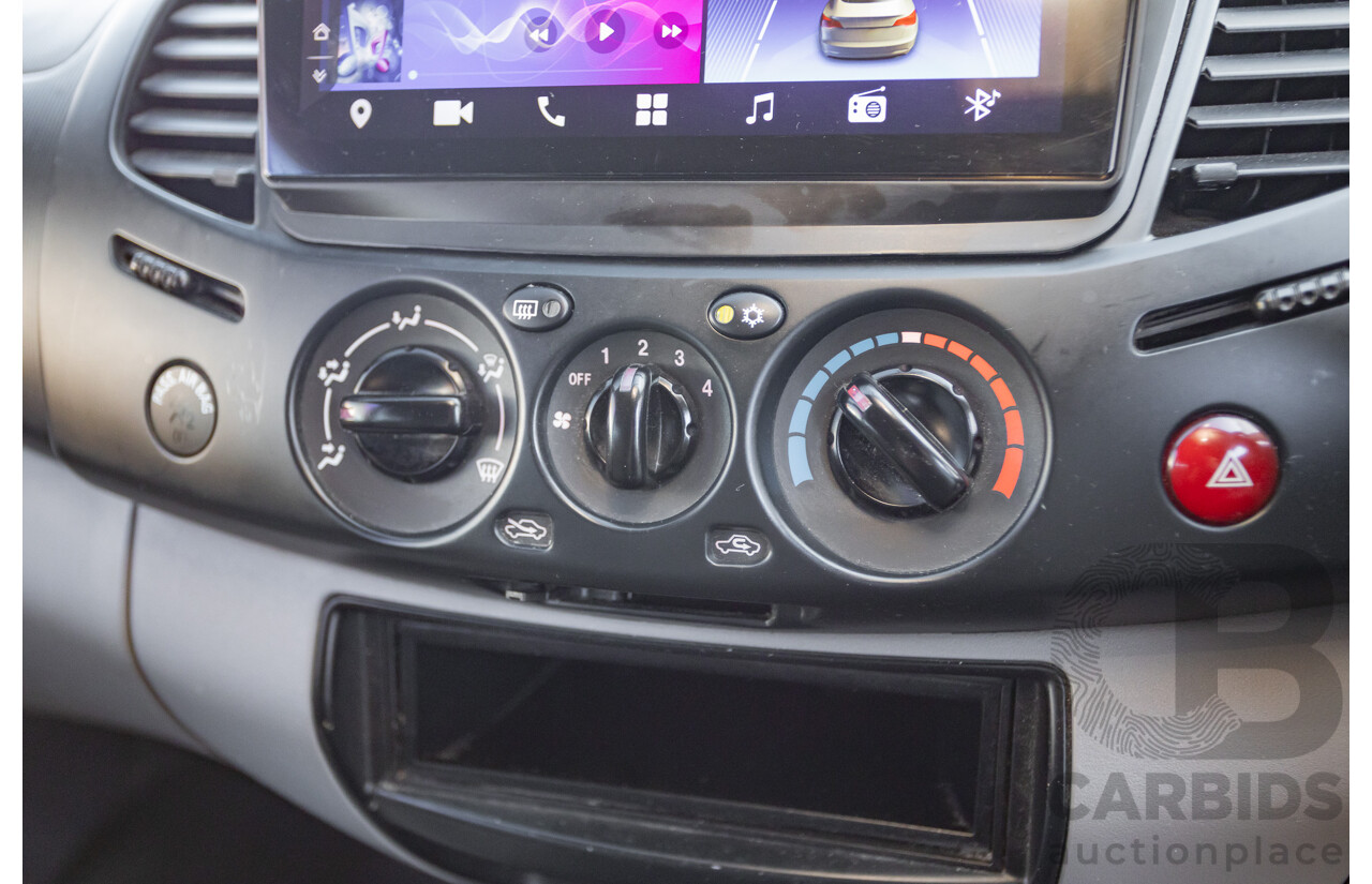 05/2015 Mitsubishi Triton GLX (4x4)  MN MY15 Double Cab Utility Black Turbo Diesel 2.5L