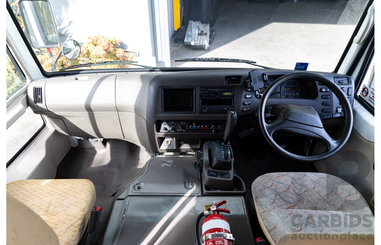 10/2012 Mitsubishi Rosa BE600 25 Seater 4d White Turbo Diesel 4.9L