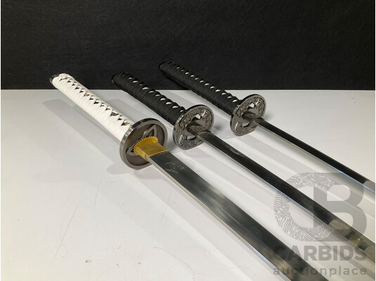 1661400 · Three Samurai Display Swords with Scabbards