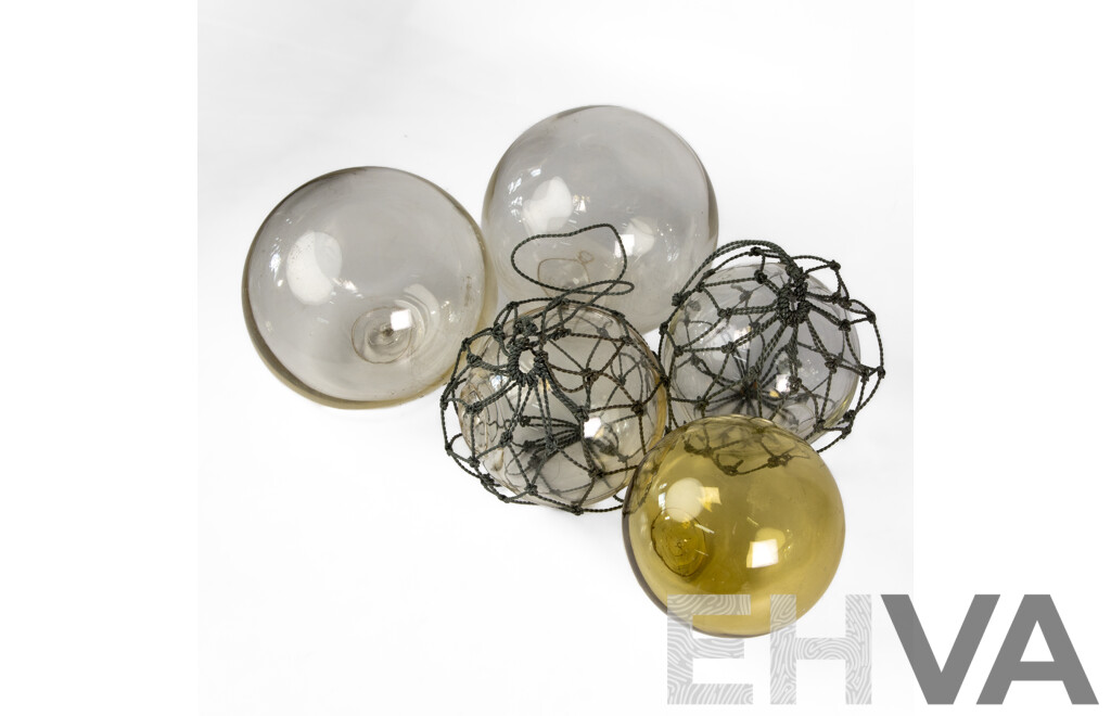 Collection of Five Japanese Hand Blown Glass Fishing Buoys in Various Sizes
