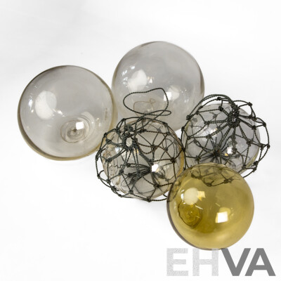 Collection of Five Japanese Hand Blown Glass Fishing Buoys in Various Sizes